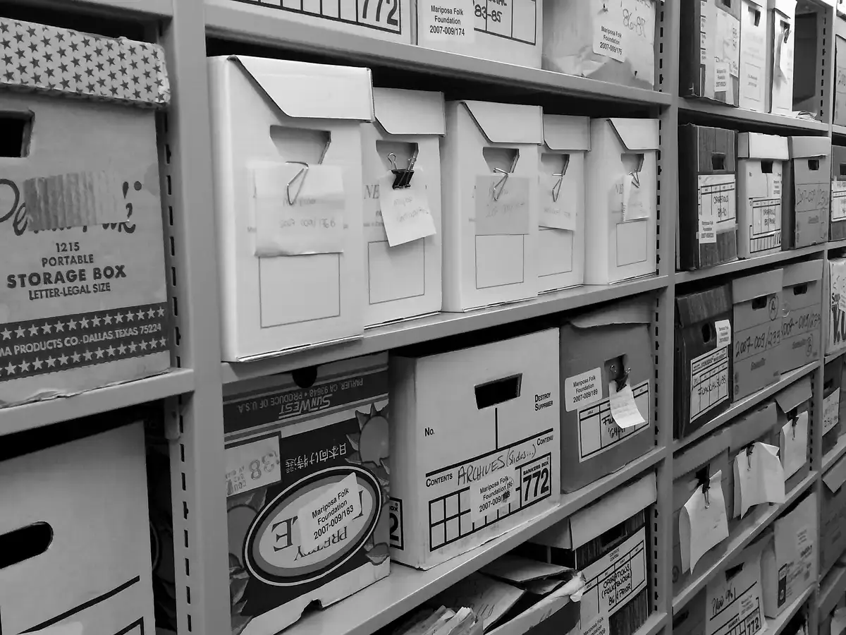 Shelves of labelled archival storage boxes